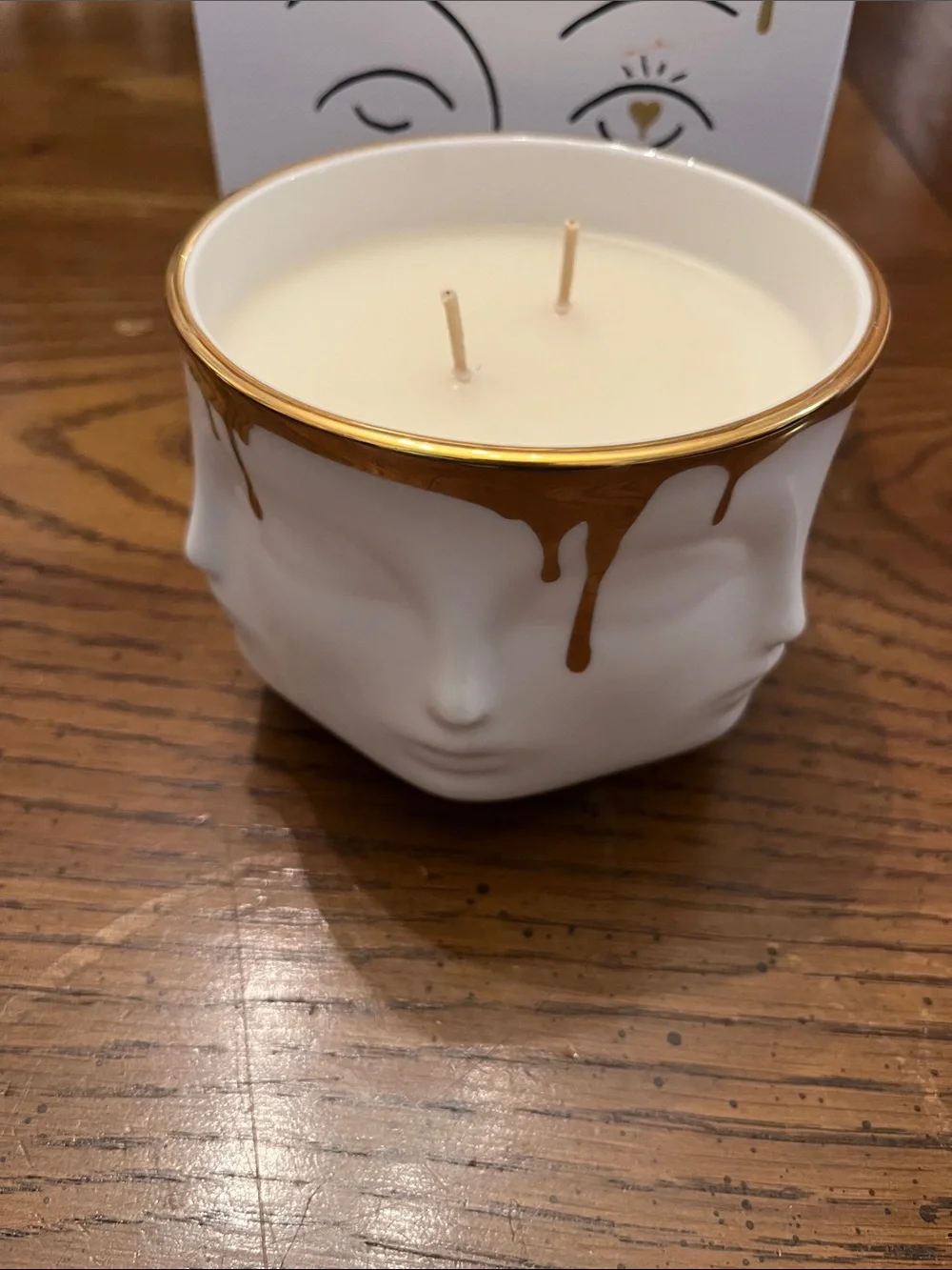 Jonathan Adler Muse Miel Double-Wick Candle in white porcelain